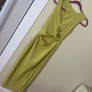 Green midi dress with cut out details and slit. Never worn.